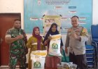 Bhabinkamtibmas dan Babinsa Dampingi Distribusi Bantuan Pangan di Desa Sekongkang Bawah